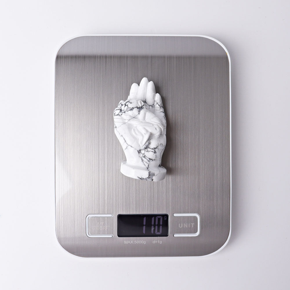 3" Howlite Hand with Sleeping Kid Crystal Carvings