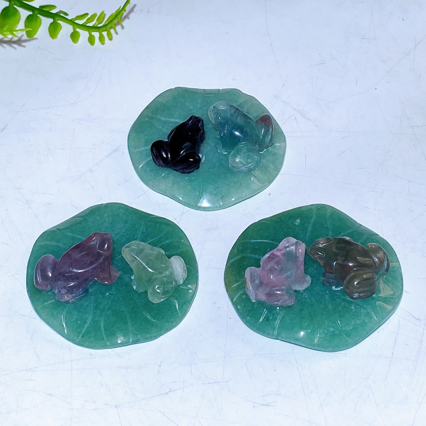 2.0" Natural Crystal Frogs on Aventurine Leaf Carving Wholesale