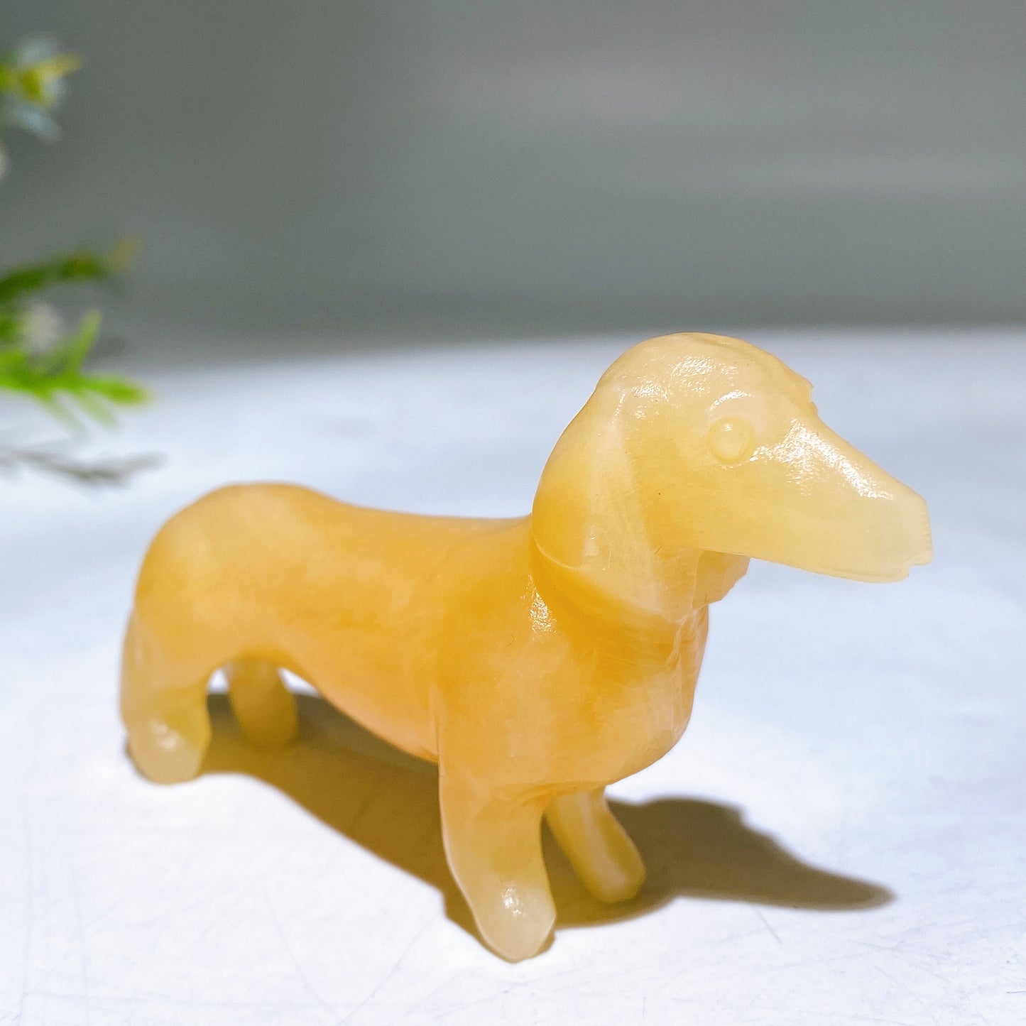 3.1" Natural Crystal Sausage Dog Carving Wholesale