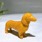 3.1" Natural Crystal Sausage Dog Carving Wholesale