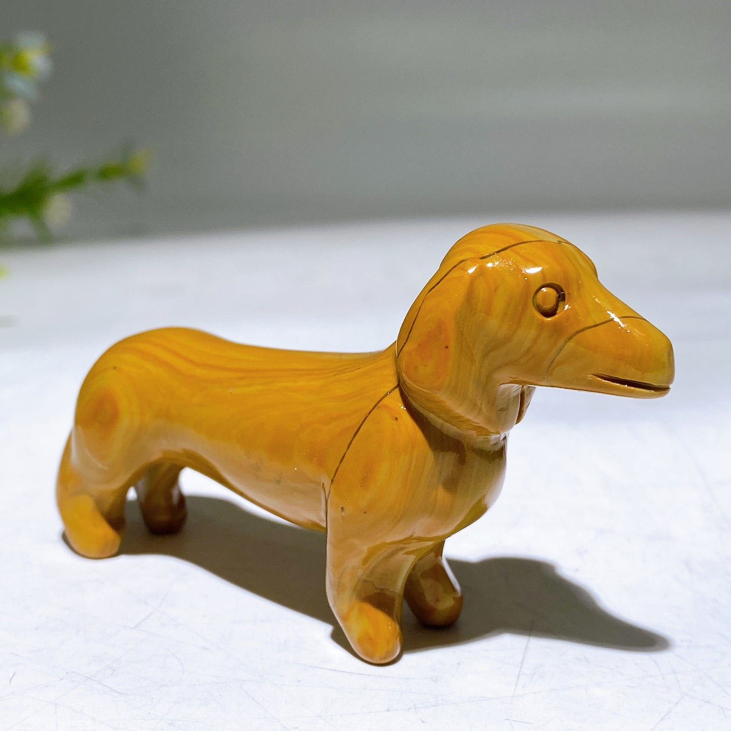 3.1" Natural Crystal Sausage Dog Carving Wholesale
