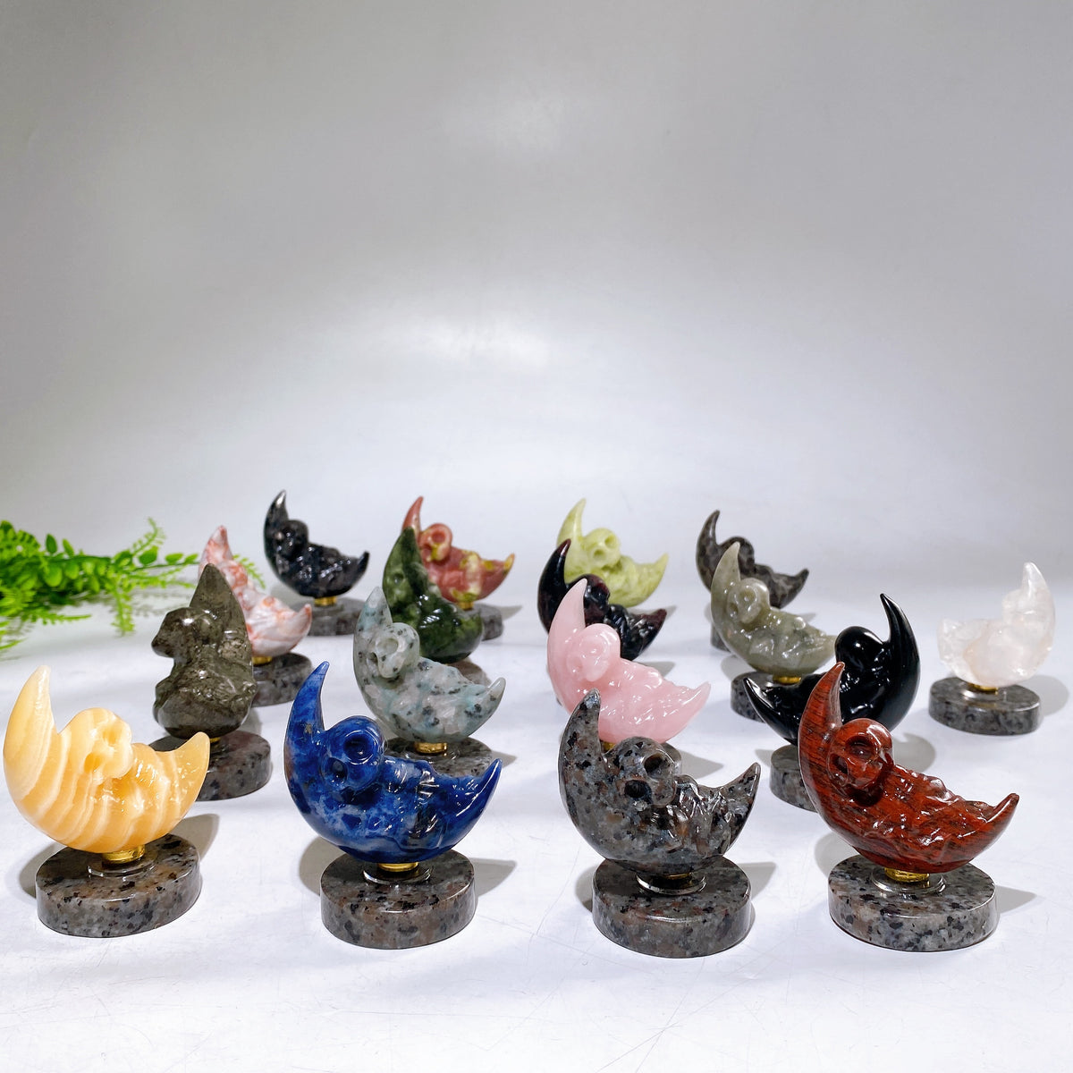 2.2" Natural Crystal Spinning Skeleton on Moon Carving with Yooperlite Base Carving Wholesale
