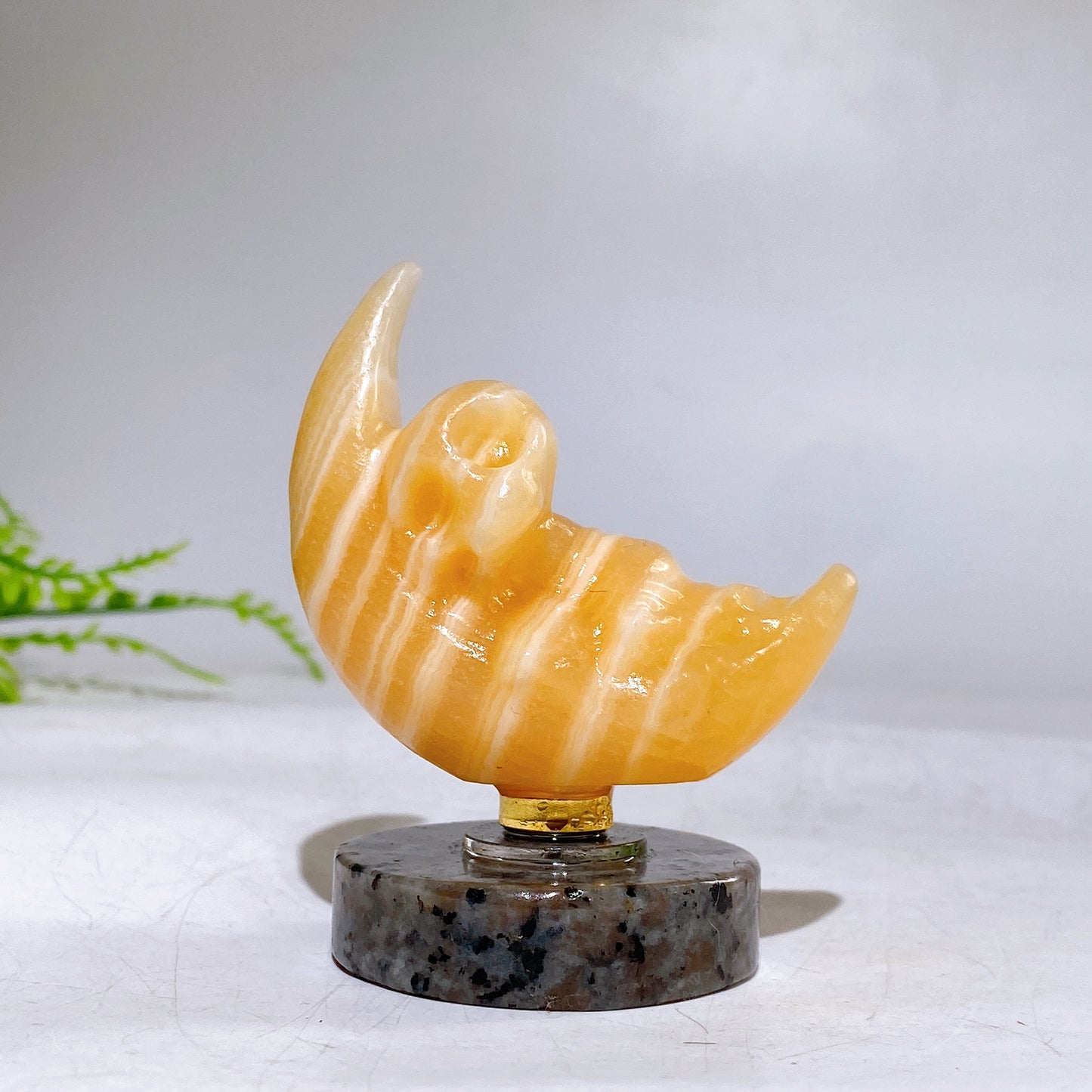 2.2" Natural Crystal Spinning Skeleton on Moon Carving with Yooperlite Base Carving Wholesale