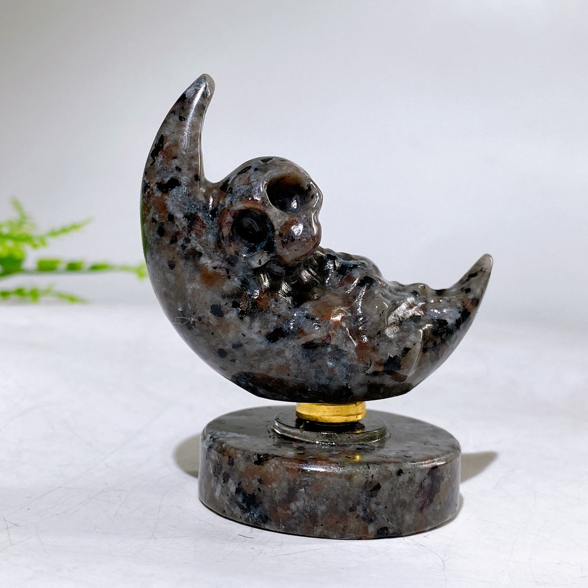 2.2" Natural Crystal Spinning Skeleton on Moon Carving with Yooperlite Base Carving Wholesale