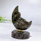 2.2" Natural Crystal Spinning Skeleton on Moon Carving with Yooperlite Base Carving Wholesale