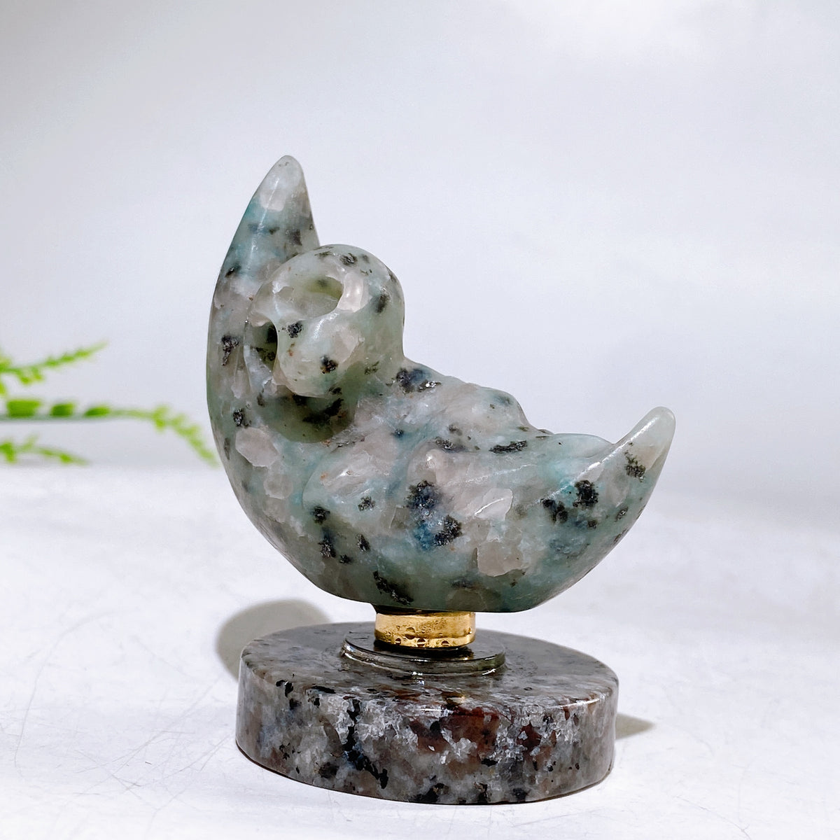2.2" Natural Crystal Spinning Skeleton on Moon Carving with Yooperlite Base Carving Wholesale