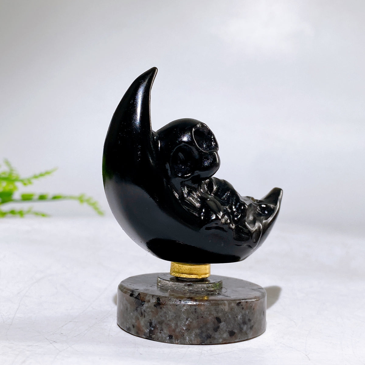 2.2" Natural Crystal Spinning Skeleton on Moon Carving with Yooperlite Base Carving Wholesale