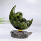 2.2" Natural Crystal Spinning Skeleton on Moon Carving with Yooperlite Base Carving Wholesale
