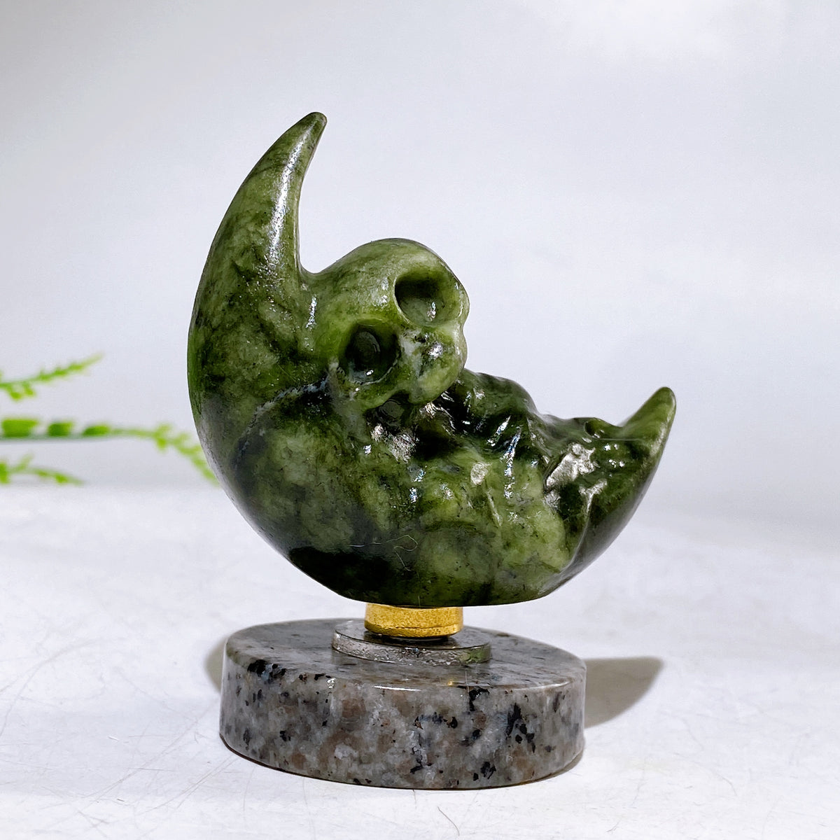 2.2" Natural Crystal Spinning Skeleton on Moon Carving with Yooperlite Base Carving Wholesale