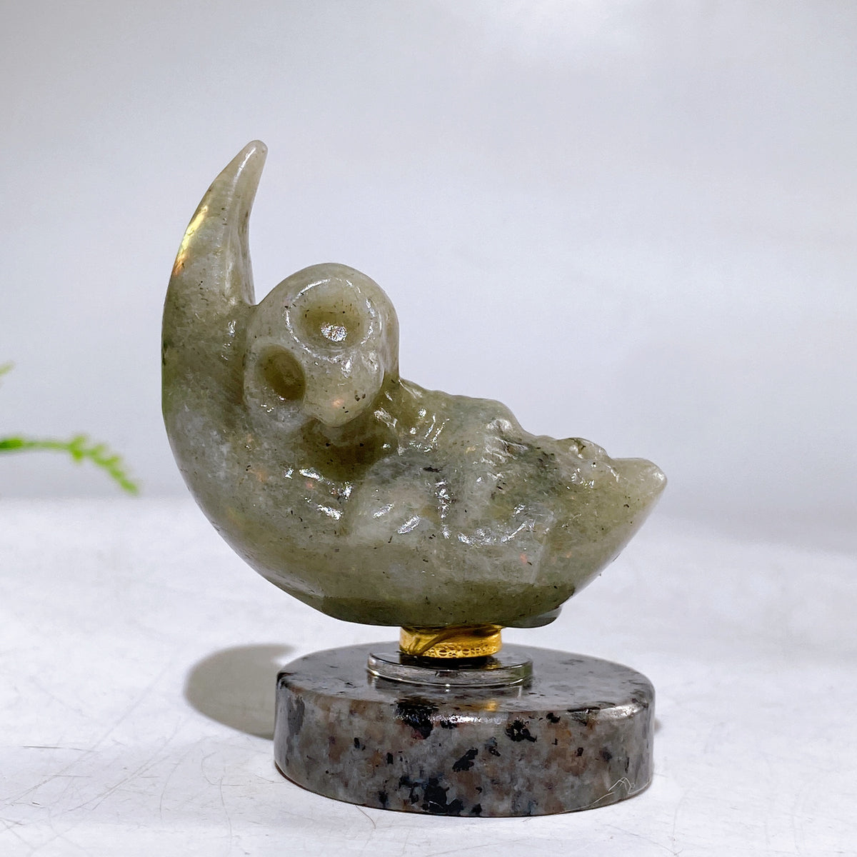 2.2" Natural Crystal Spinning Skeleton on Moon Carving with Yooperlite Base Carving Wholesale