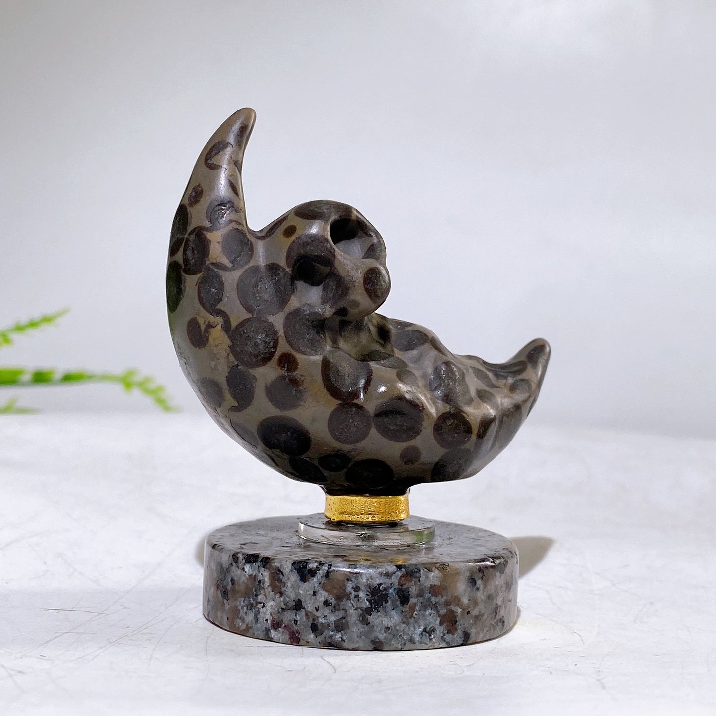 2.2" Natural Crystal Spinning Skeleton on Moon Carving with Yooperlite Base Carving Wholesale