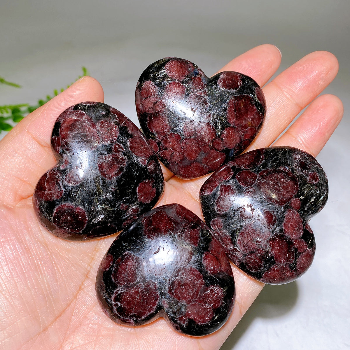 1.8"-2.0" Natural Astrophylite with Garnet Heart Wholesale