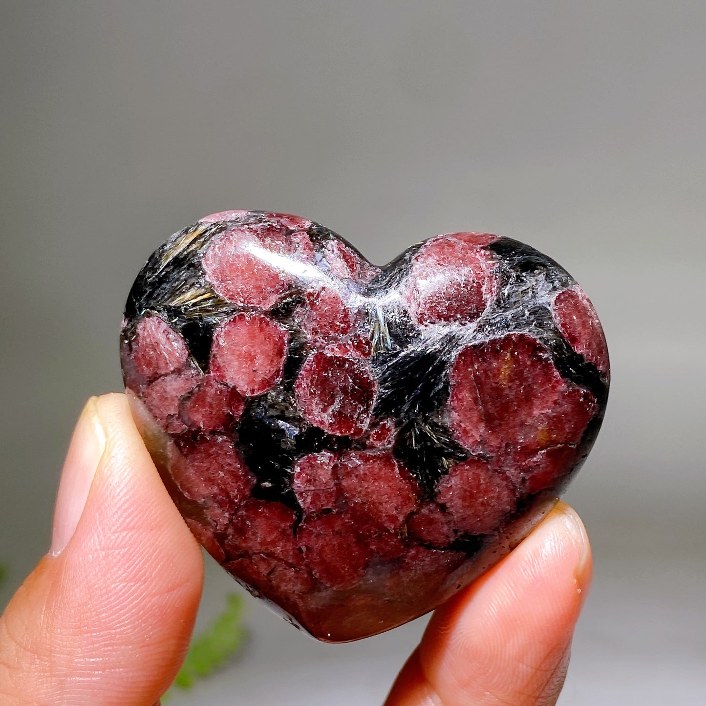 1.8"-2.0" Natural Astrophylite with Garnet Heart Wholesale