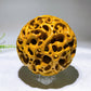 10cm Natural Yellow Mudstone Hollow-Carved Sphere Wholesale