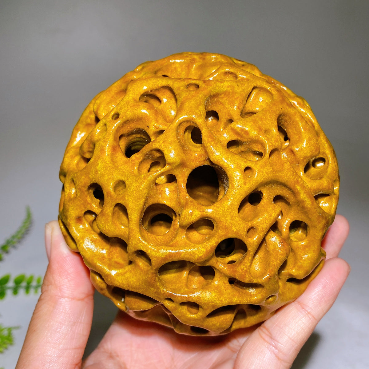 10cm Natural Yellow Mudstone Hollow-Carved Sphere Wholesale