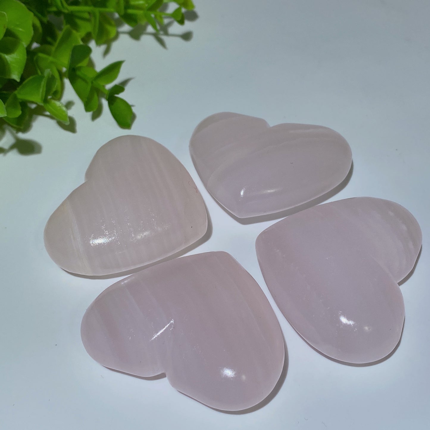 2.2"-2.4" UV Reactive Pink Calcite Heart Palm Bulk Wholesale